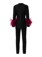 Suit with feathers