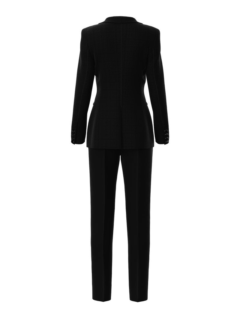 Black suit with red zippers